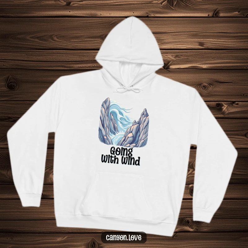 Funny hoodie illustrating dynamic wind streams sweeping past immense, stylized rock formations, offering warmth and style.