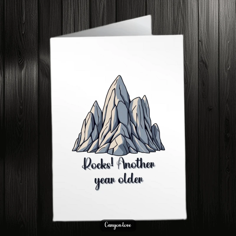 Funny Free Printable birthday card featuring jagged, abstract rock formations in sharp geometric planes, ready for a festive greeting.