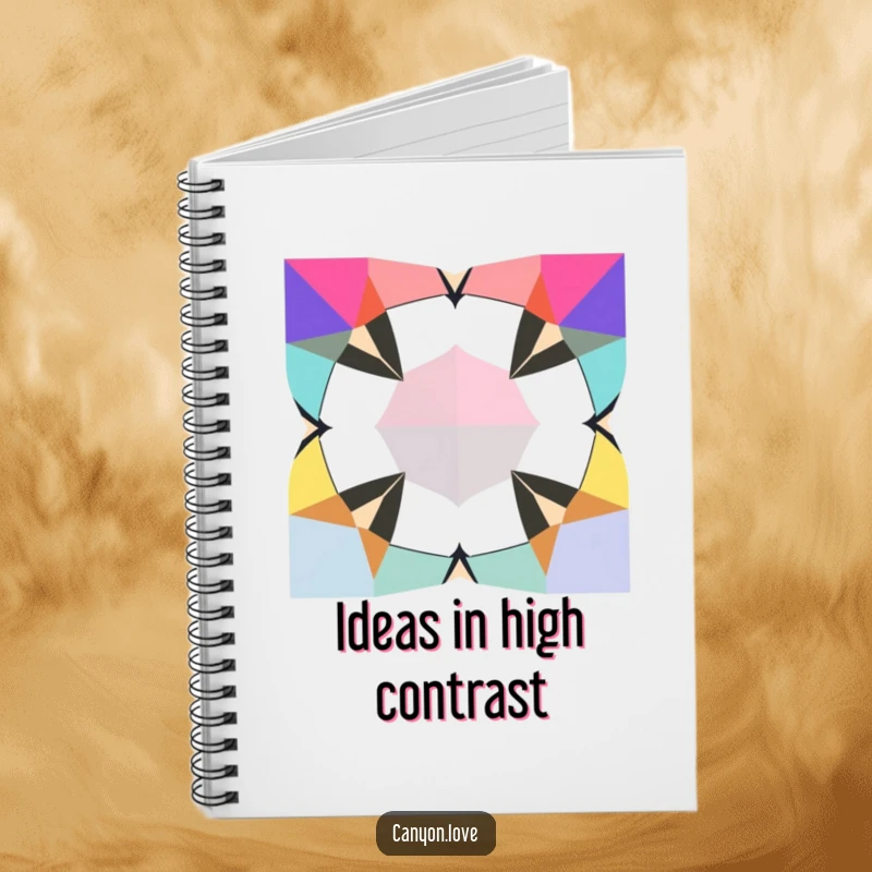 Funny Notebook with a cover of jagged geometric shapes in contrasting bold colors, ideal for notes and creative expression.